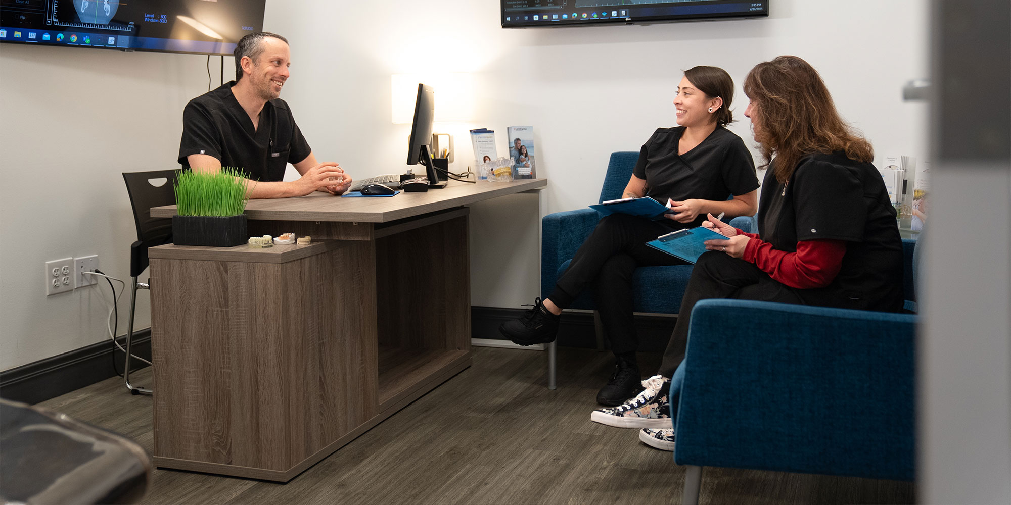 Doctor Talking with his team members
