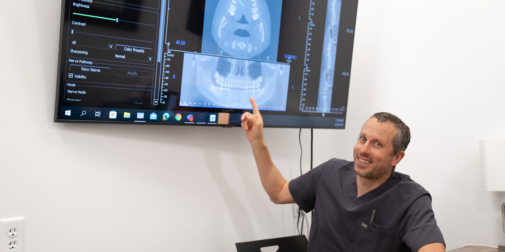 Doctor going over implant maintenance