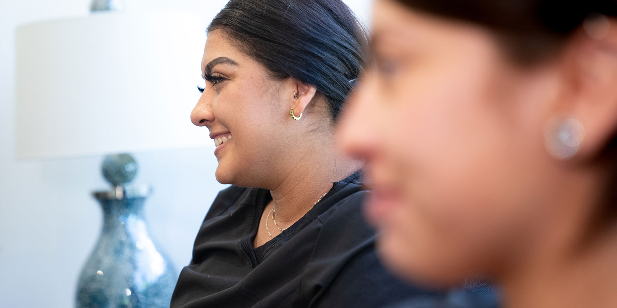 team members laughing and smiling
